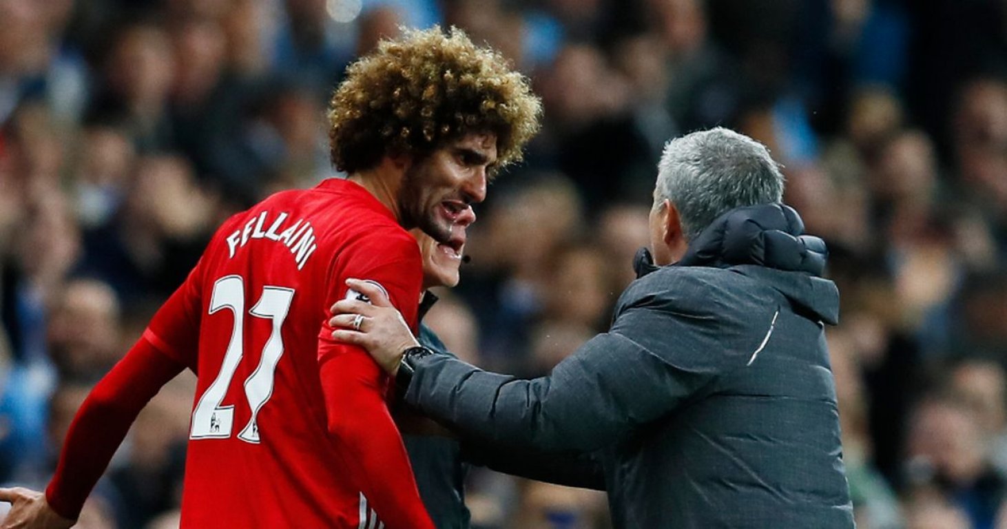 manchester-uniteds-marouane-fellaini-after-being-sent-off-with-manager-jose-mourinho