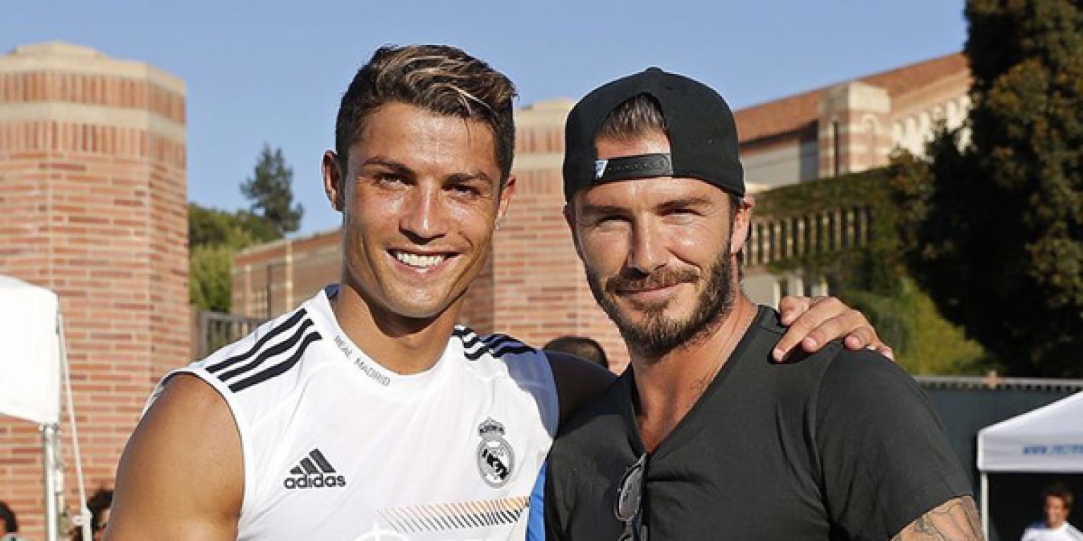 Cristiano-Ronaldo-of-Real-Madrid-and-former-player-David-Beckham-pose-after-a-training-session-at-UCLA-Campus-2103869