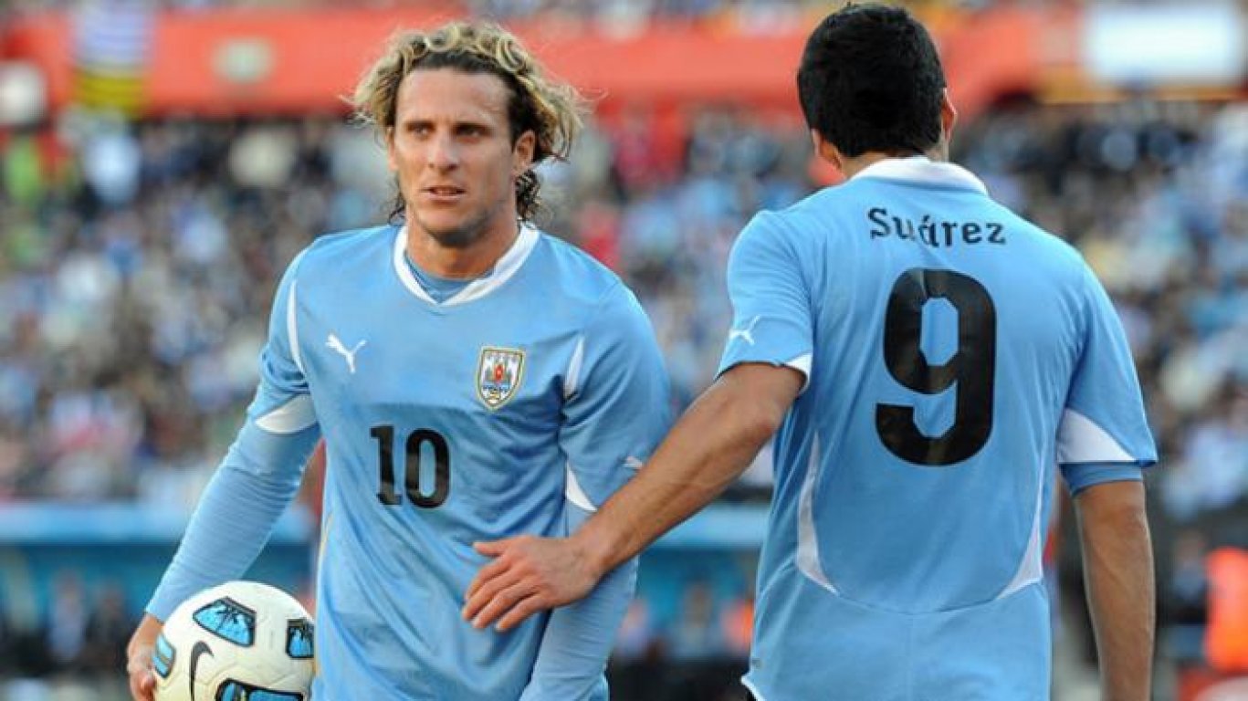20140409-192121-duet-diego-forlan-dan-luis-suarez