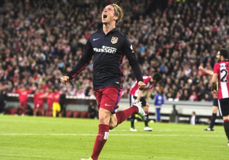 Atletico zahvaljujući Torresu zadržao korak za Barcelonom