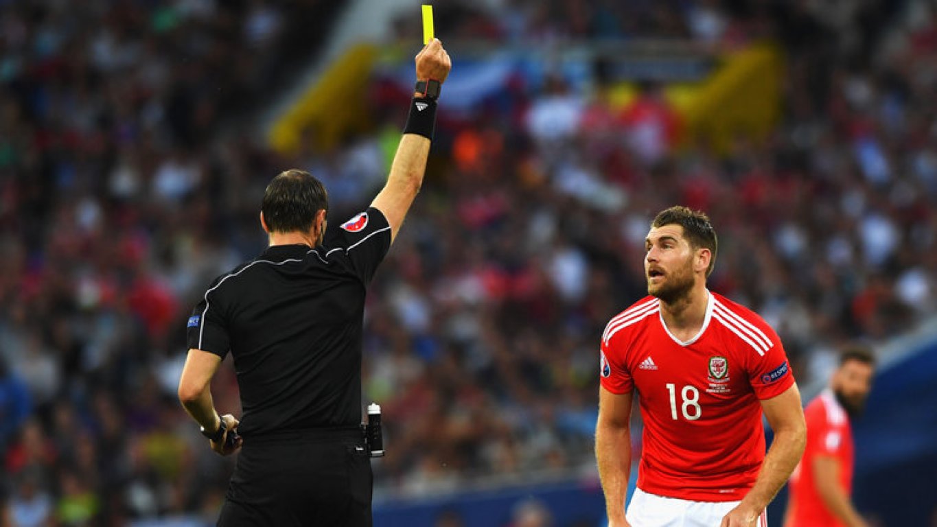 jonas-eriksson-referee-yellow-card-wales-striker-sam-vokes-3495806