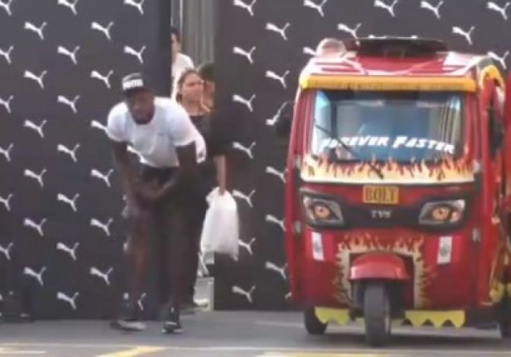 Usain Bolt u trci brži od taksi vozila na tri točka
